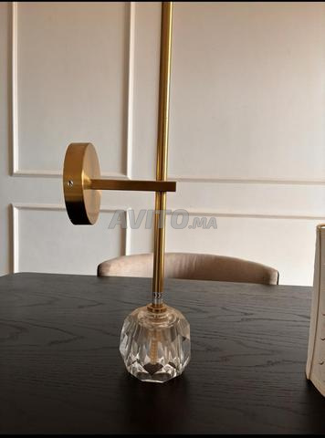 Applique murale dorée design moderne