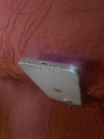 iphone 14 vitre arrière cassé batterie 76/100