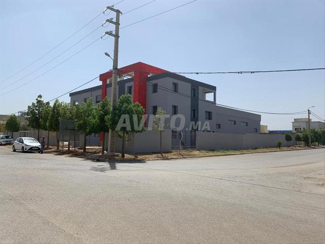 Local Industriel à Loué ou partagé