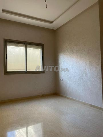F3 avec GRANDE COUR de 35m² au Centre Bouskoura