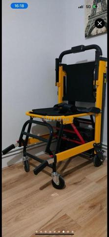 Fauteuil de transfert de patients dans les escaliers avec roues
