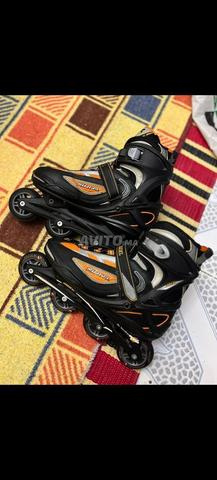 Chaussures de sport (patins à roulettes) portées une fois