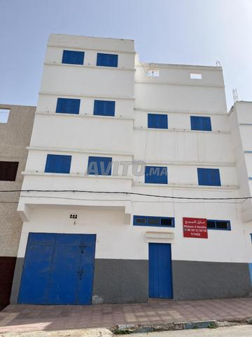 Maison titrée à vendre composée de cinq appartements à vendre à Boulaalam