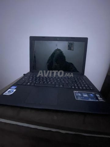 PC portable asus 9dim chwiya