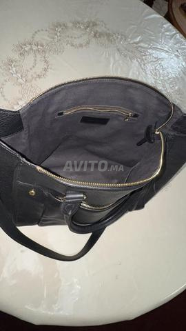 حقيبة كلوي سوداء أصلية
