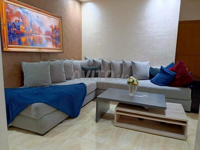 Séjour avec table basse extensible