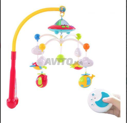 Mobile musical rotatif Huanger pour bébé