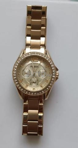 ساعة فوسيل FOSSIL ذهبية نسائية مع كريستال - أصلية