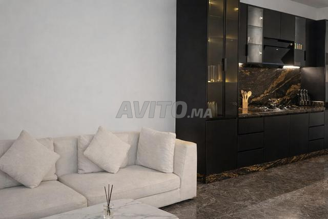 Cuisine noire premium avec marbre sur mesure