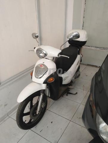 Kymco italie d'origine 125 en règle classique