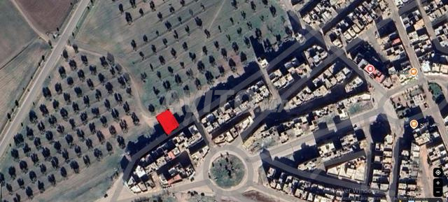 Terrain à vendre titré RDC commercial et deux étages superficie 94m