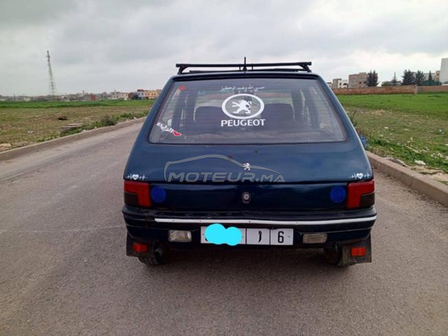 بيجو 205  إيصانص موطور كحل 