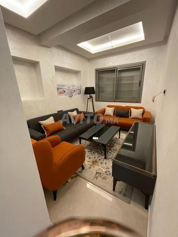 Ensemble de canapé avec tapis et deux tables