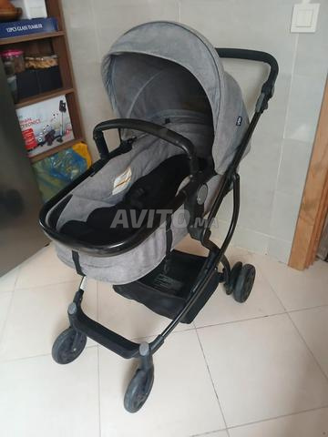 عربة أطفال ذات وجهين