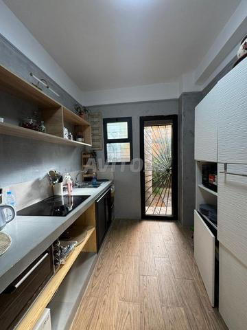 Un joli rez-de-jardin en location meublé