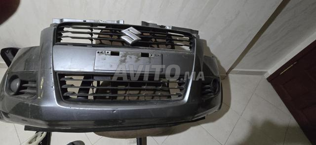 واقي صدمات أمامي سوزوكي سبلاش و ضوء أحمر