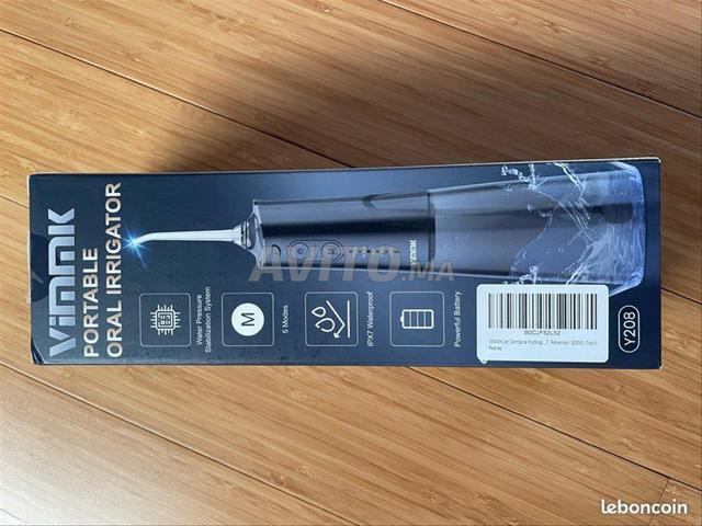 جهاز تنظيف الأسنان المائي النفاث