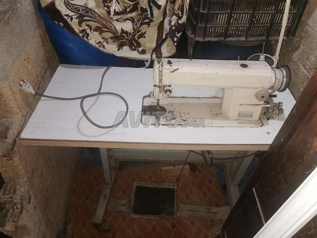 ماكينة خياطة باقة نقية و خدامة
