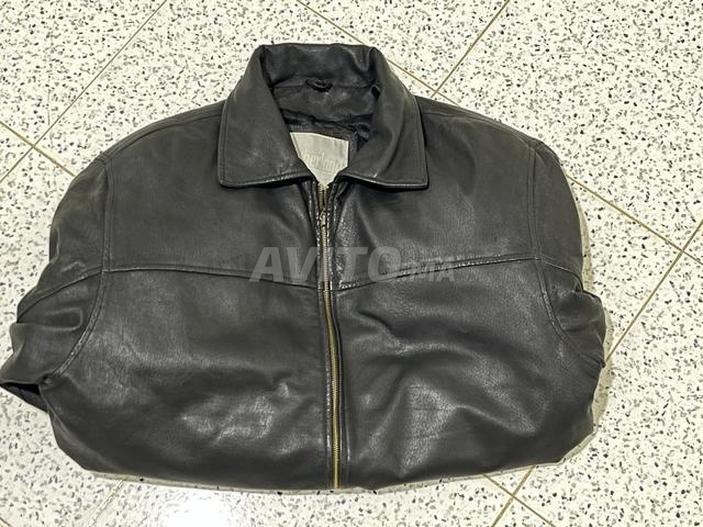 جاكيت جلد طبيعي مقاس L/Xl