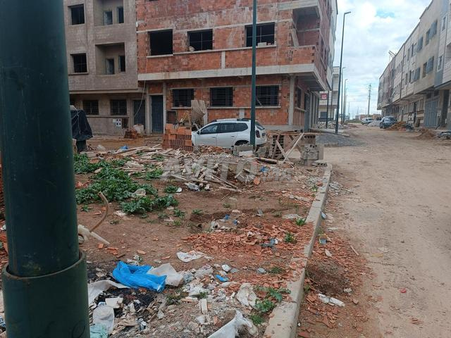 Terrain de deux façades de 102 m - 2