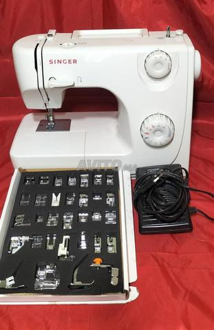 ماكينة خياطة سنجر مع 32 ملحق