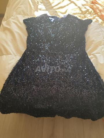 ملابس بنات بين 12 و عام 14