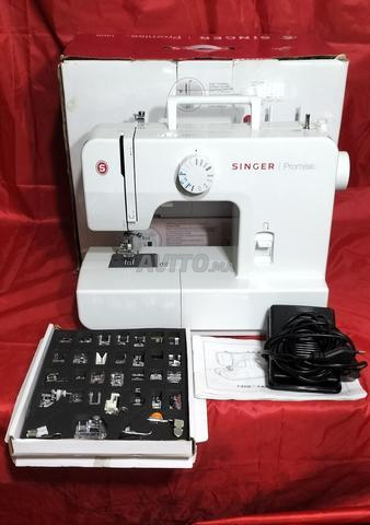 ماكينة خياطة جديدة مع 32 ملحقًا