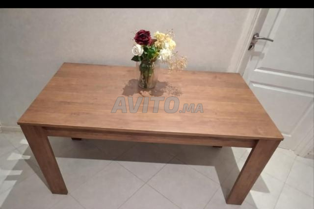 طاولة طعام قابلة للتمديد