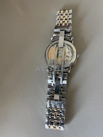 ساعة لونجين ذهب عيار 18 قيراط ومرصعة بالماس