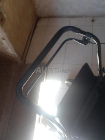 كرسي متحرك للمشي مع مقعد - 2