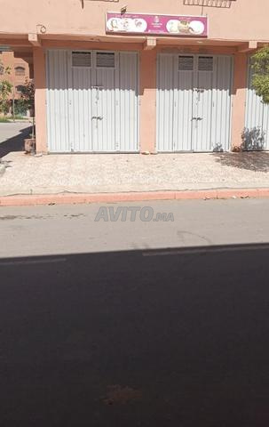 محل مع مرآبين للإيجار للتخزين محل للكراء