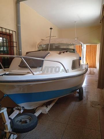 قارب كابينة نقي 2 محركات 30CV حزمة كاملة