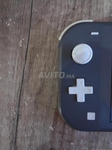 Nintendo switch lite رمادي مع قرص FIFA 23 - 2