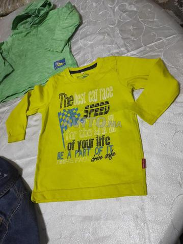 مجموعة ملابس أولاد بحالة كالجديدة - 2