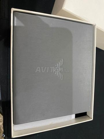 ساعة إمبوريو أرماني وسوارها كالجديدة - 2