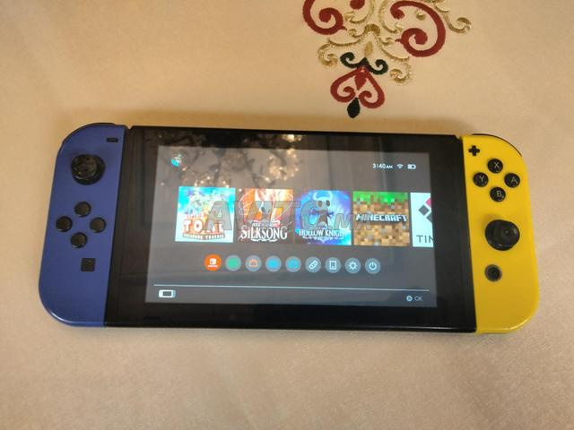 نينتندو سويتش بحالة جيدة، مفلاشية، عامرة ألعاب - 2