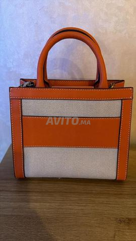 حقيبة غيس برتقالي - 2