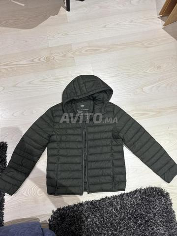 سترة منفوخة سيليو خضراء مقاس L قابلة للتفاوض