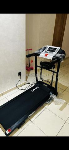 سير كهربائي مع مدلك