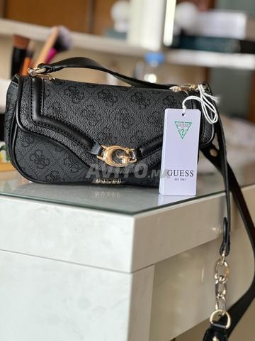 حقيبة غيس ميني ديا شعار