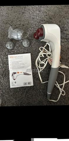 جهاز تدليك كهربائي