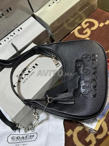 حقيبة أنيقة Coach CO9540 - 2