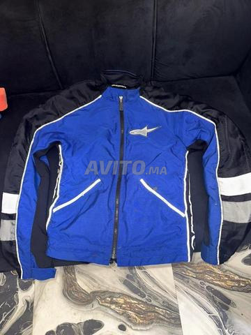 جاكيت ديال المطر XL ببروتيج للحماية من الصدمات - 2