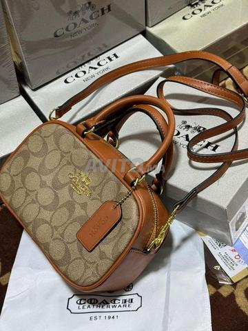 حقيبة أنيقة Coach CO9541 - 2