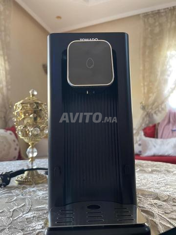 Distributeur d'eau chaude Tomado TWD7535B presque neuf