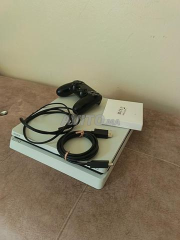 PS 4 SLIM  ba9i jdid 3ad ja mn lkharij - 2