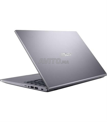كمبيوتر محمول ASUS X509 - 2