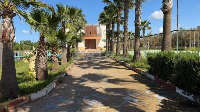 مزرعة-فيلا موثقة 7500 متر مربع على بعد 15 دقيقة من دار بوعزة