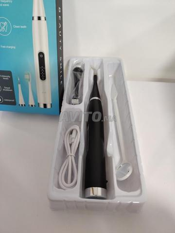 جهاز تنظيف الأسنان الكهربائي القابل لإعادة الشحن - 2