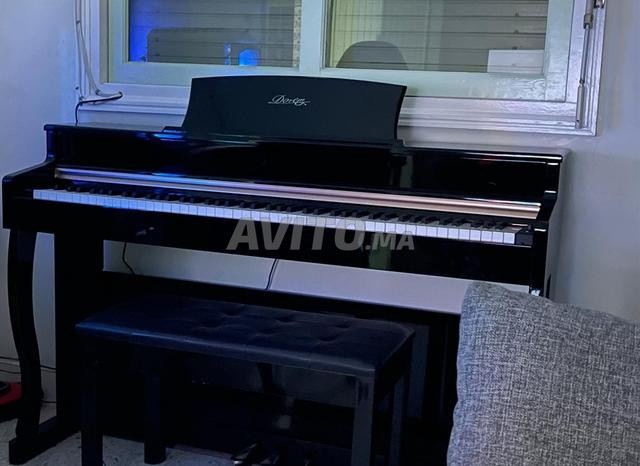 Piano Doremi en excellent état - 2